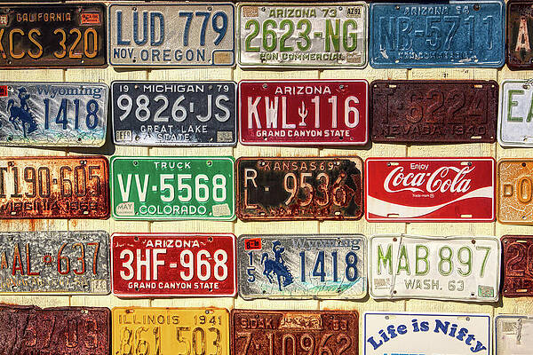 Wall Art featuring the photograph Vintage License Plates Display by Tatiana Travelways