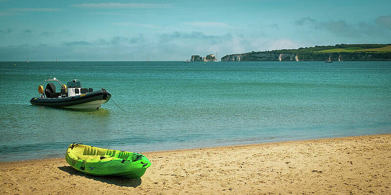 Serene Beach with Kayak and Boat Wall Art