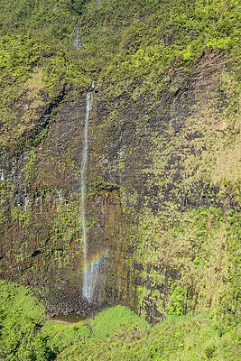Hawaii Wall Art featuring the photograph Waterfall And Misty Rainbow In The Sun On Kauai, Hawaii by Nancy Gleason