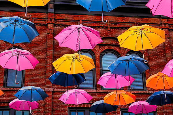 Wall Art featuring the photograph Wausau's Colorful Umbrellas On Third Street by Dale Kauzlaric