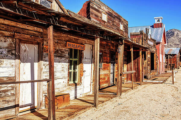 Wall Art featuring the photograph Wild West Storefronts - Chloride, Arizona by Tatiana Travelways