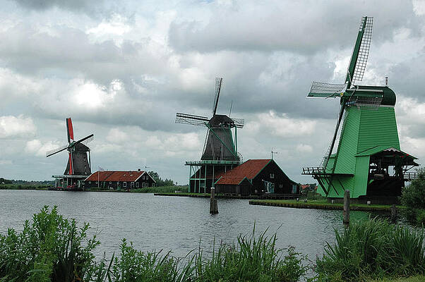 Sky Wall Art featuring the photograph Windmills On The Lake by Steve Templeton