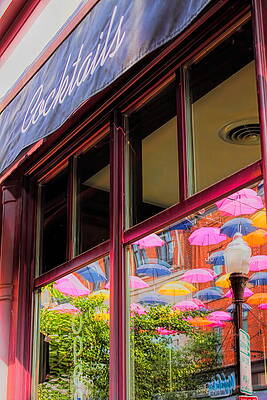 Wall Art featuring the photograph Window Reflection Of Wausau's Umbrellas by Dale Kauzlaric