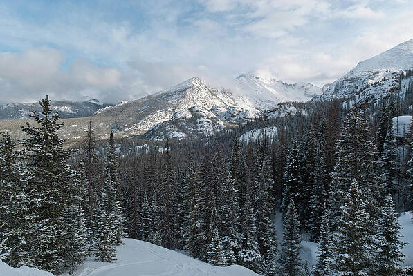Rocky Mountain National Park Photograph - Winter Clouds Lifting Above Long's Peak by Cascade Colors