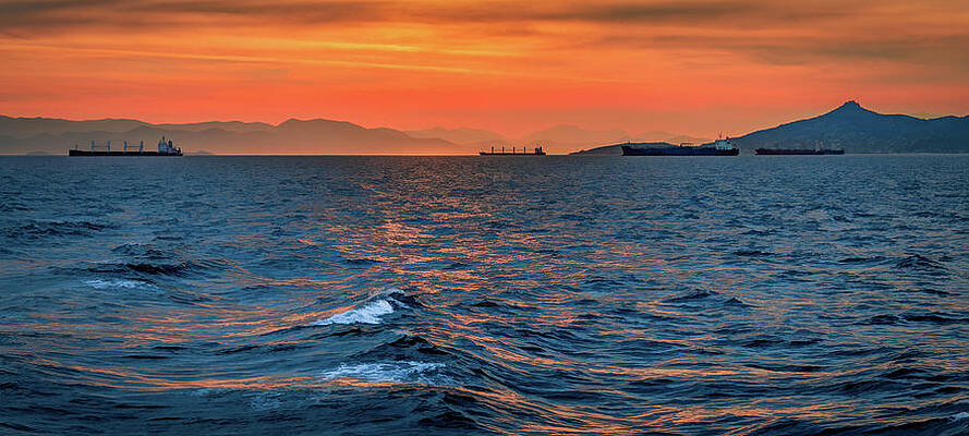 Vibrant Wall Art featuring the photograph Winter Sunset Off The Coast Of Greece by Marcy Wielfaert