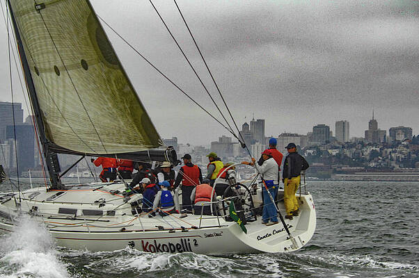 Water Photograph - Yacht Kokopelli Sailing By San Francisco City Skyline by Bonnie Colgan