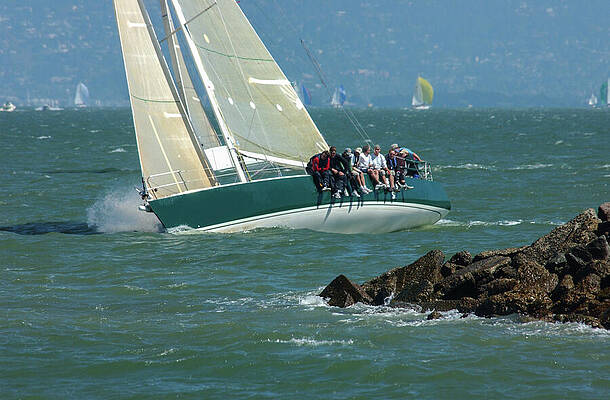Wall Art featuring the photograph Yacht Navigating The Rocks by Bonnie Colgan