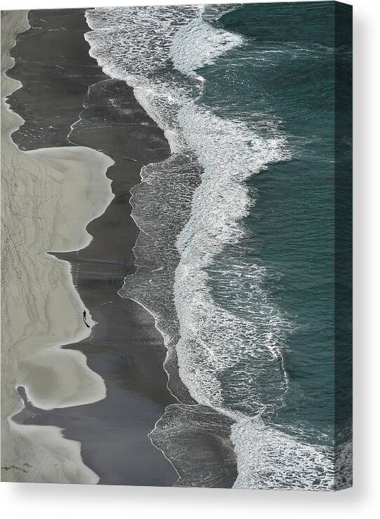 Waves Meeting the Sandy Shore Canvas Print