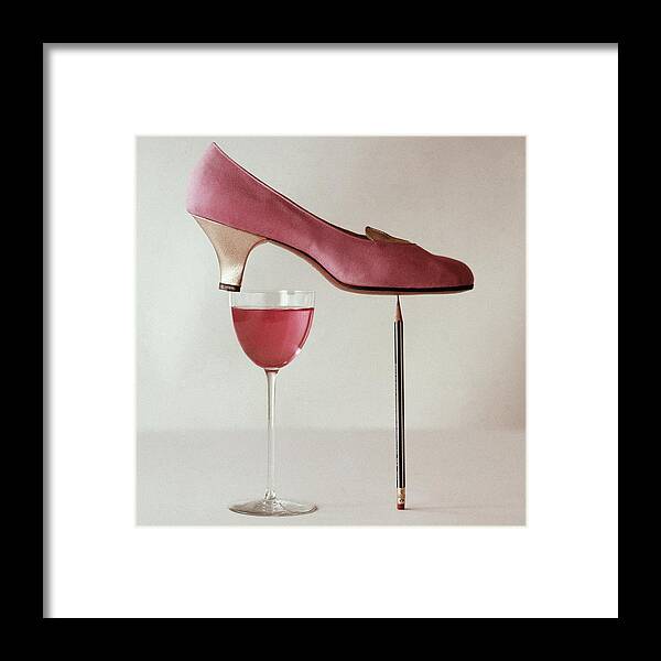 Balancing Act with Pink Shoe Framed Print featuring the photograph Pink Capezio Pump by Richard Rutledge Balancing Act with Pink Shoe Framed Print featuring the photograph Pink Capezio Pump by Richard Rutledge