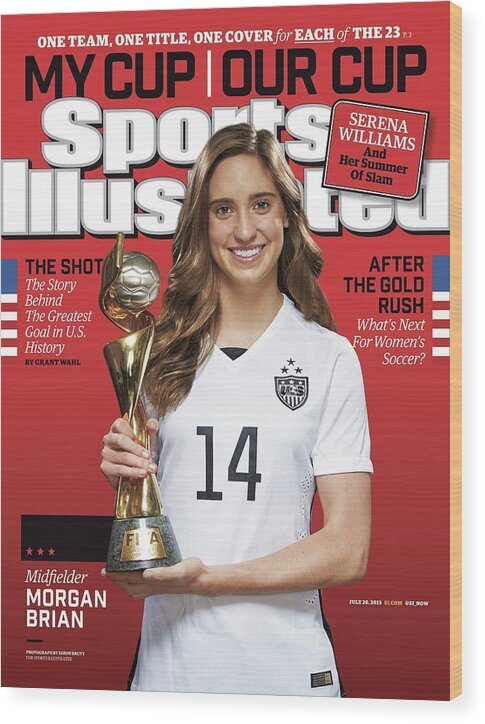Morgan Brian with FIFA Trophy Wood Print featuring the photograph Us Womens National Team 2015 Fifa Womens World Cup Champions Sports Illustrated Cover #15 by Sports Illustrated