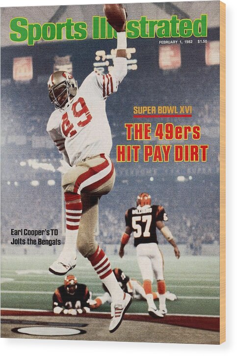 Earl Cooper's Touchdown Celebration Wood Print featuring the photograph San Francisco 49ers Earl Cooper, Super Bowl Xvi Sports Illustrated Cover by Sports Illustrated