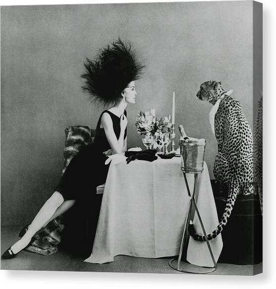 A Model With A Cheetah Canvas Art Print by Leombruno-Bodi