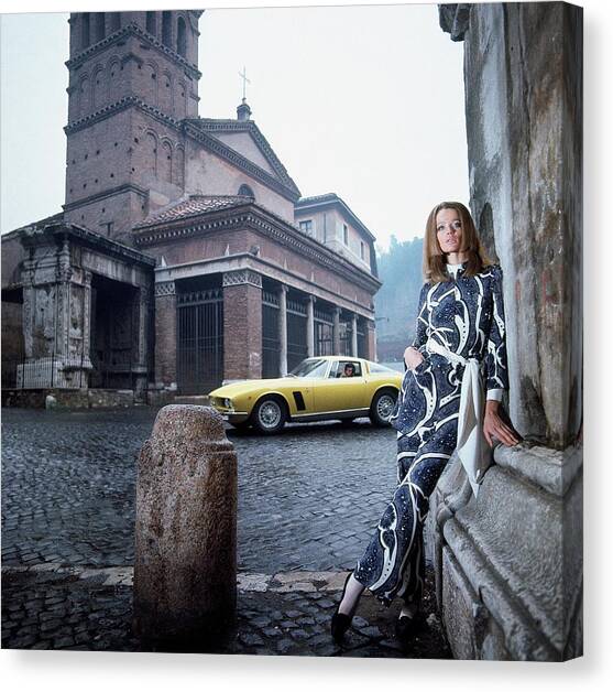 Veruschka Von Lehndorff Standing In Piazza Di San Canvas Art Print by Franco Rubartelli