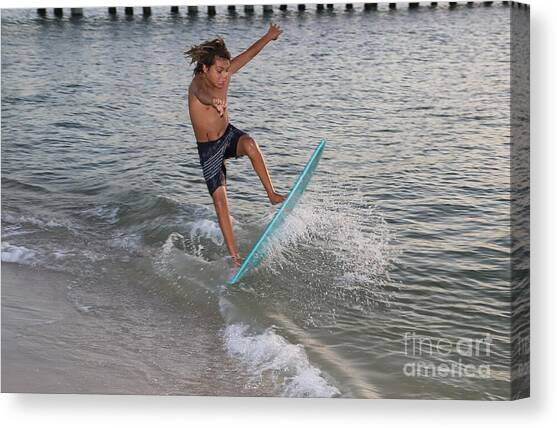 Skimboarding Trick at Sunset 7574 Canvas Art Print by Donn Ingemie