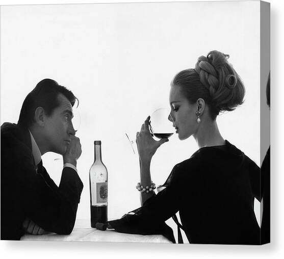 Man Gazing at Woman Sipping Wine Canvas Art Print by Bert Stern