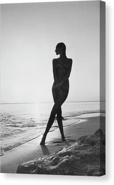 Marisa Berenson At A Beach Canvas Art Print by Arnaud de Rosnay