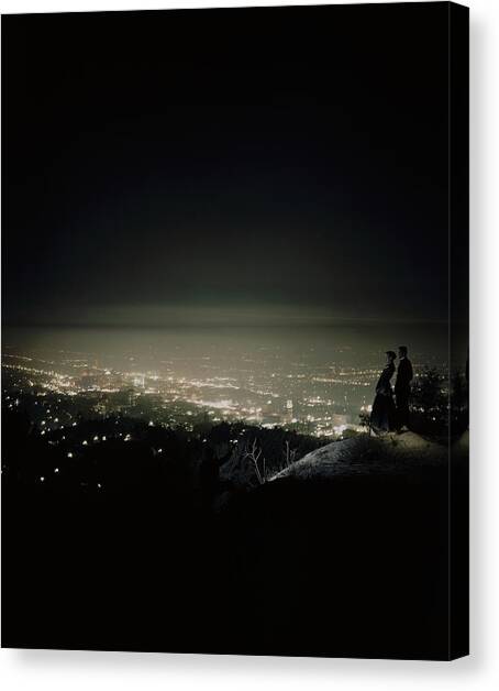 A City At Night Canvas Art Print by Constantin Joffe