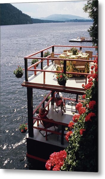 Lakeside Deck with Flowers Metal Print