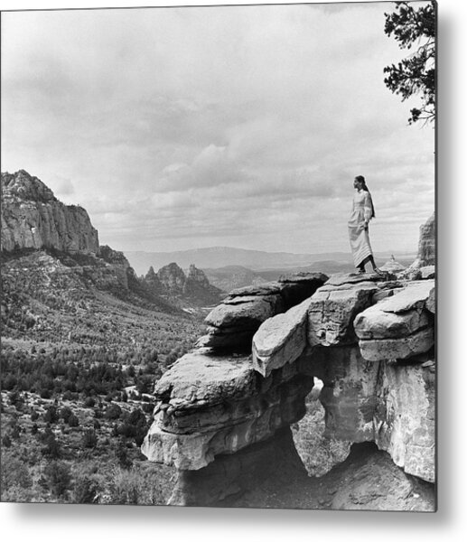 Woman Standing on Sedona Rock Formation Metal Print