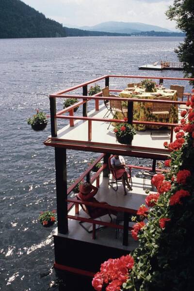 Lakeside Deck with Flowers Poster