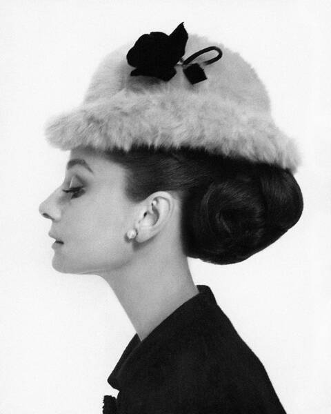 Elegant Woman in Profile with Hat Poster