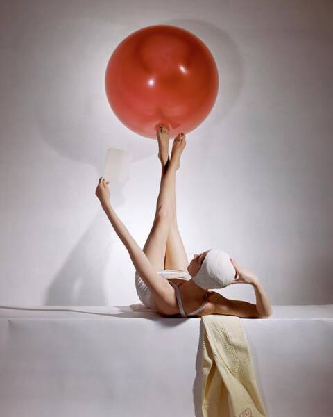 Elegant Pose with Red Balloon Poster