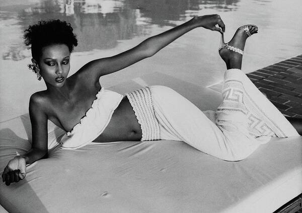 Iman Wearing A Yves Saint Laurent Skirt Poster by Kourken