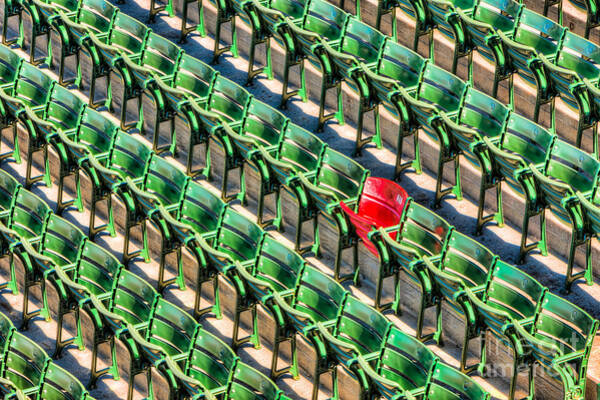 Red Chair in Sea of Green Seats Poster