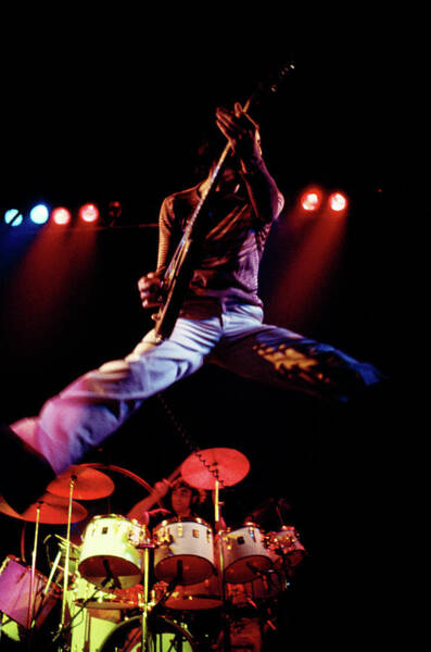 Rock Guitarist Leaping on Stage Wall Art