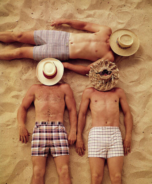 Men Relaxing on a Sandy Beach Wall Art