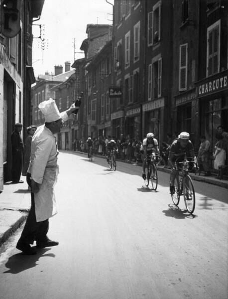 Cyclists Racing Through European Streets Wall Art
