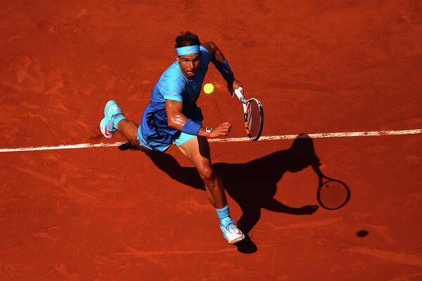 Tennis Player in Action on Clay Court Wall Art