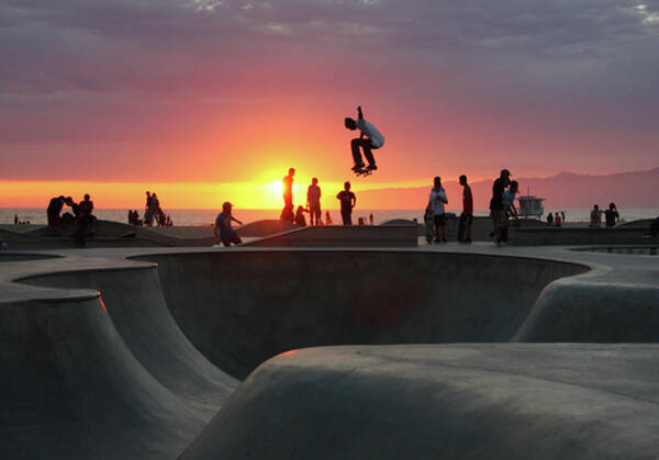 Skateboarder Soars at Sunset Wall Art