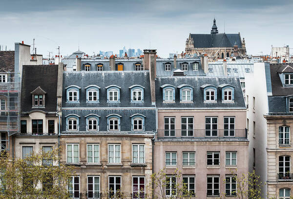 Parisian Rooftops Under Cloudy Skies Wall Art