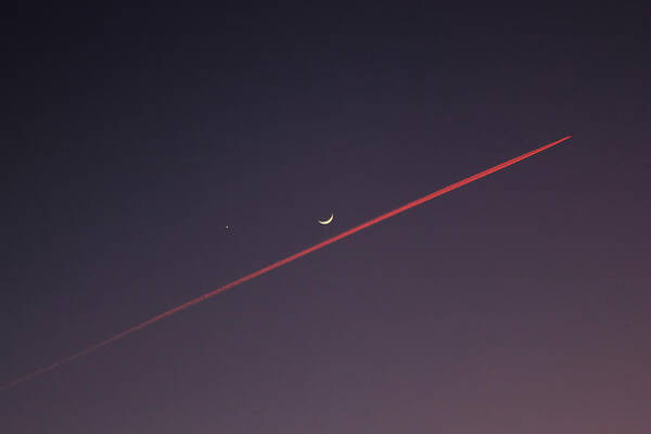 Crescent Moon and Contrail at Dusk Wall Art