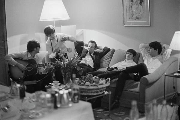 Famous Band Relaxing in Hotel Room Wall Art