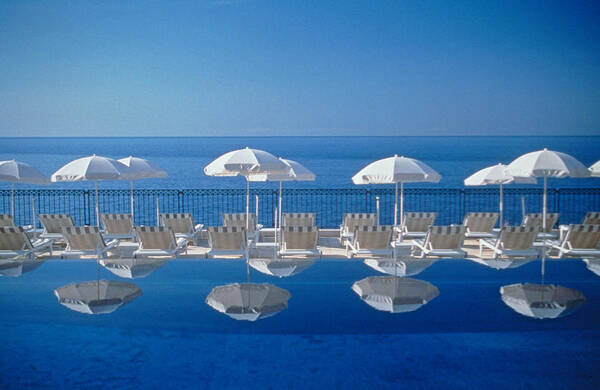 Serene Oceanfront Pool Lounge Wall Art