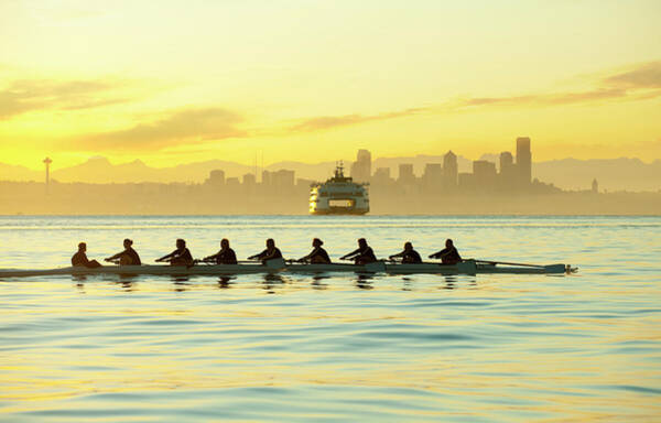 Rowers at Sunrise on Tranquil Water Wall Art