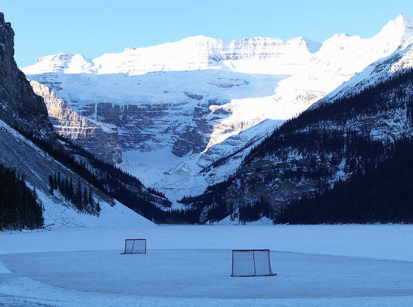 Ice Rink in Mountain Valley Wall Art
