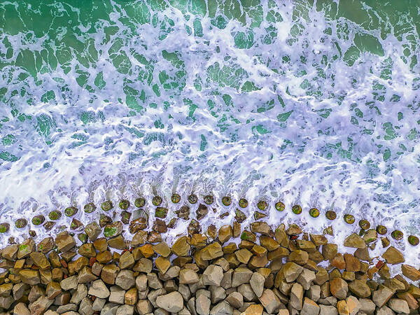 Waves Crashing Over Rock Barrier Art Print