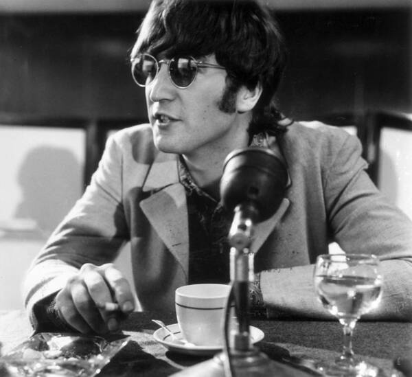 John Lennon at a Press Conference Wall Art