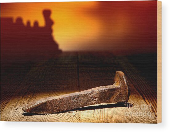 Rusty Railroad Spike on Wooden Surface Wood Print