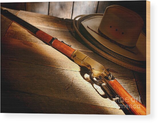 Vintage Western Rifle on Wooden Table Wood Print
