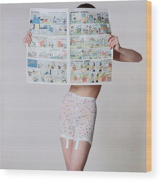 Person Reading Newspaper in Underwear Wood Print