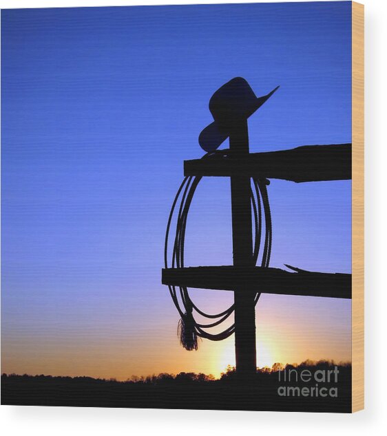 Silhouette of Cowboy Hat and Lasso at Sunset Wood Print