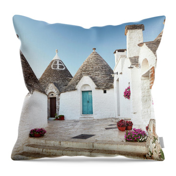 Italy, Apulia, Bari District, Itria Valley, Alberobello, Famous For Its Unique Trullo Buildings #1 Throw Pillow