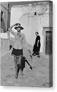 Woman Walking on a Sunny Street Canvas Print