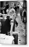 Smiling Woman in a Restaurant Canvas Print by Arthur Elgort