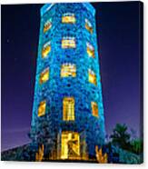 Illuminated Stone Tower at Night Canvas Print