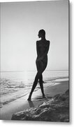 Silhouette of a Woman at Sunset Metal Print